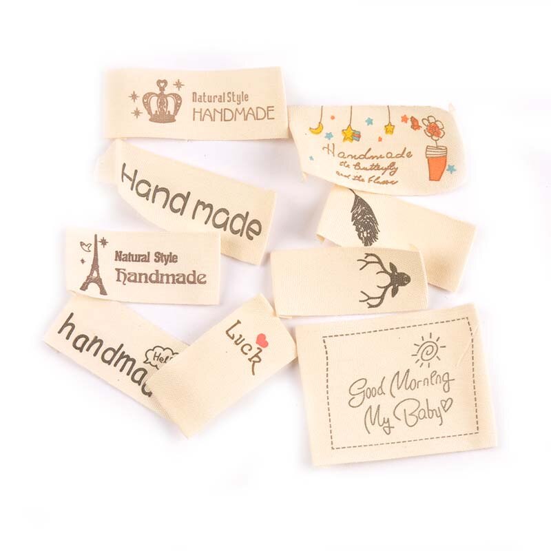 50 Uds Beige impreso tela de algodón de tejido carta etiquetas para coser etiquetas de prendas de hecho a mano etiquetas para Ropa Accesorios de artesanía para manualidades mezcla