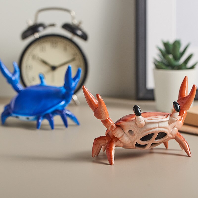 Krabbenförmiger kabelloser bluetooth-mini-lautsprecher mit handyhalterung, tragbarer surround-sound-knopf, audioelektronik