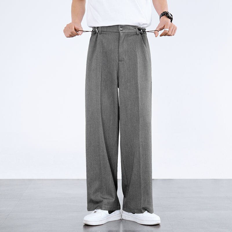 Pantalones de traje holgados de primavera y verano para hombre, pantalones ajustados de pierna ancha, elásticos, drapeados, informales, de color sólido que combinan con todo
