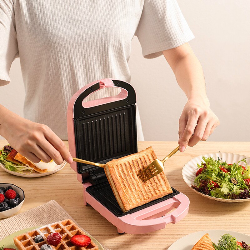 Sandwich machine breakfast machine home light food machine waffle maker machine multi-function heating toast pressure toaster: Pink