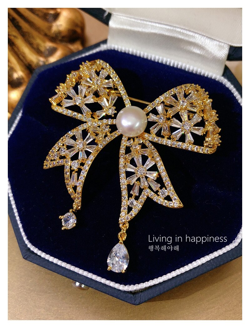 Broches para mujer de lujo con perlas de imitación de cristal, ramillete de lazo, suéter, Pin de traje, accesorios, joyería fina, broche Vintage
