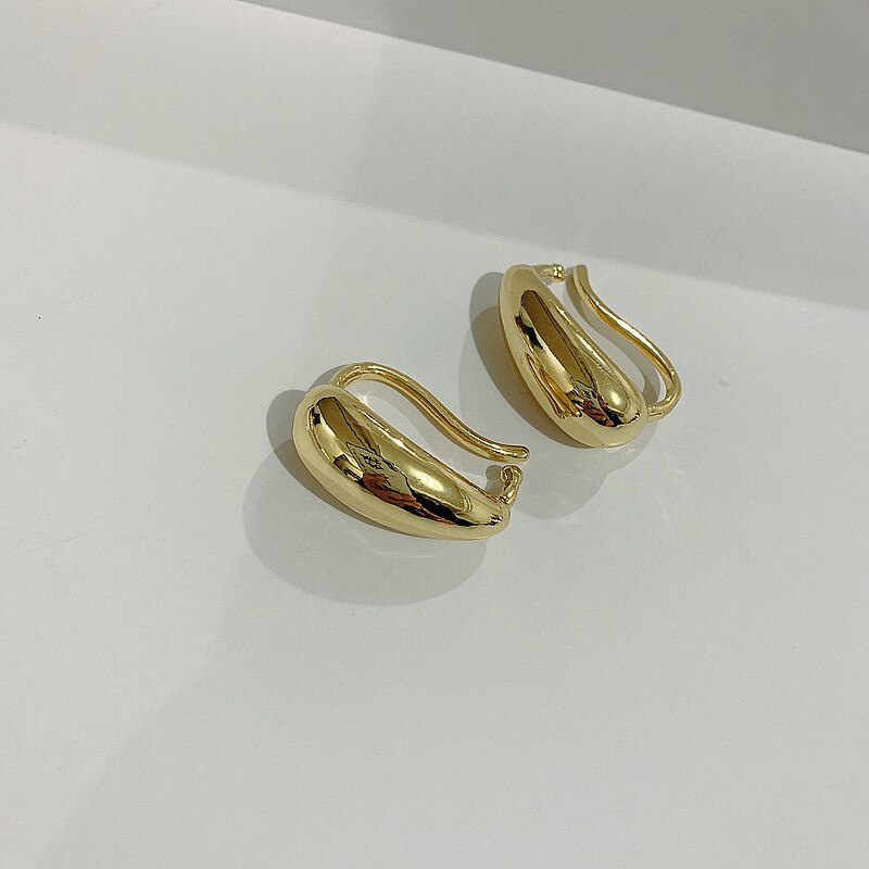 Karma Goldplated oorbellen olijf groene en warm bruine steentjes