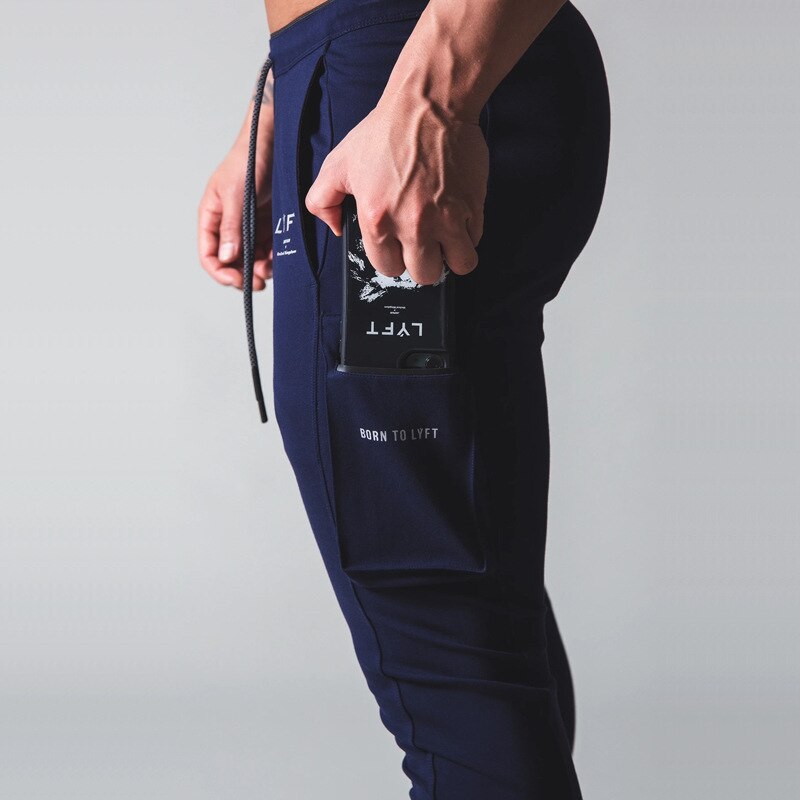 Herre lomme joggingbukser mænd fitness fitness fitness bukser man bomuld jogging sportsbukser plus size træningstøj: M / Flåde