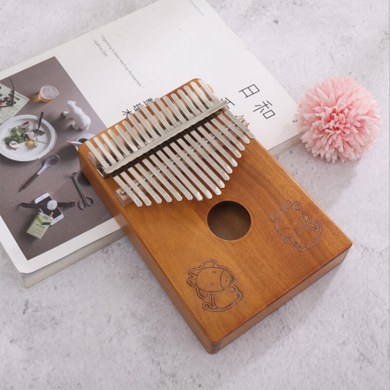 17- taster kalimba thumb piano kinesisk stjernetegn mønster bærbart thumb piano gir god lyd og studiebok for nybegynnere: Ku