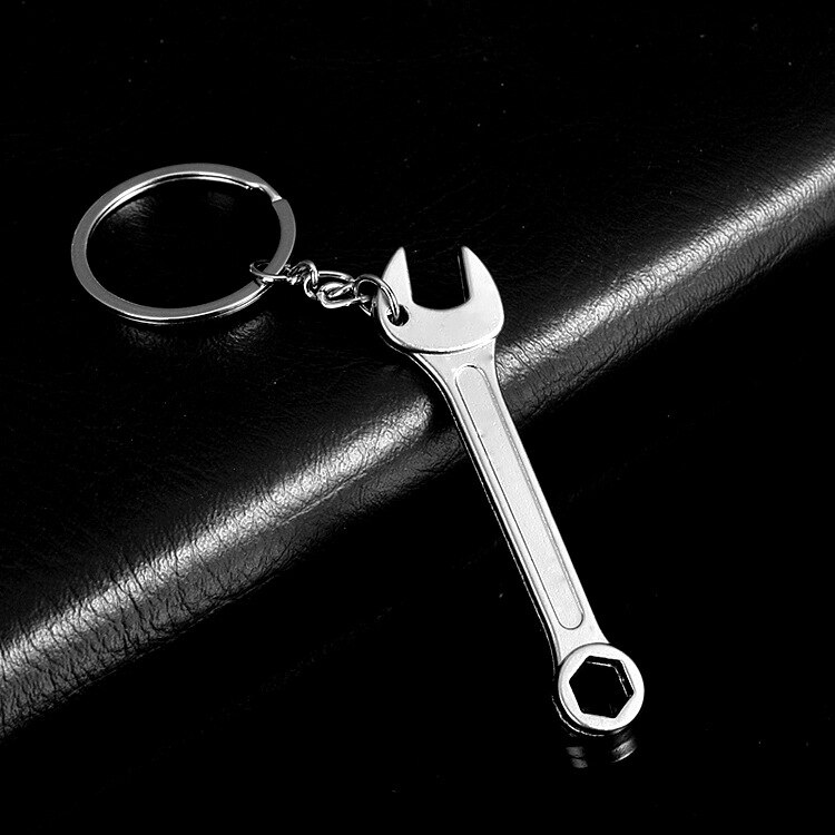 ¡Producto en oferta! Mini llave inglesa de Metal ajustable, llavero con anilla, llavero de , de: Otro