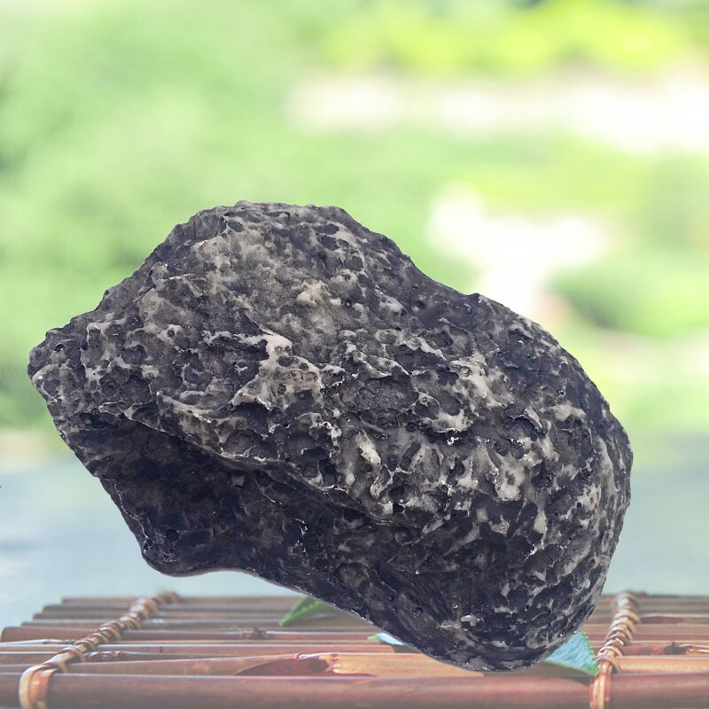 Ulkona puutarhan turva -avain rock -laatikko piilotettu piiloutumaan kiven turvallisuuteen turvallinen varastointi piilossa