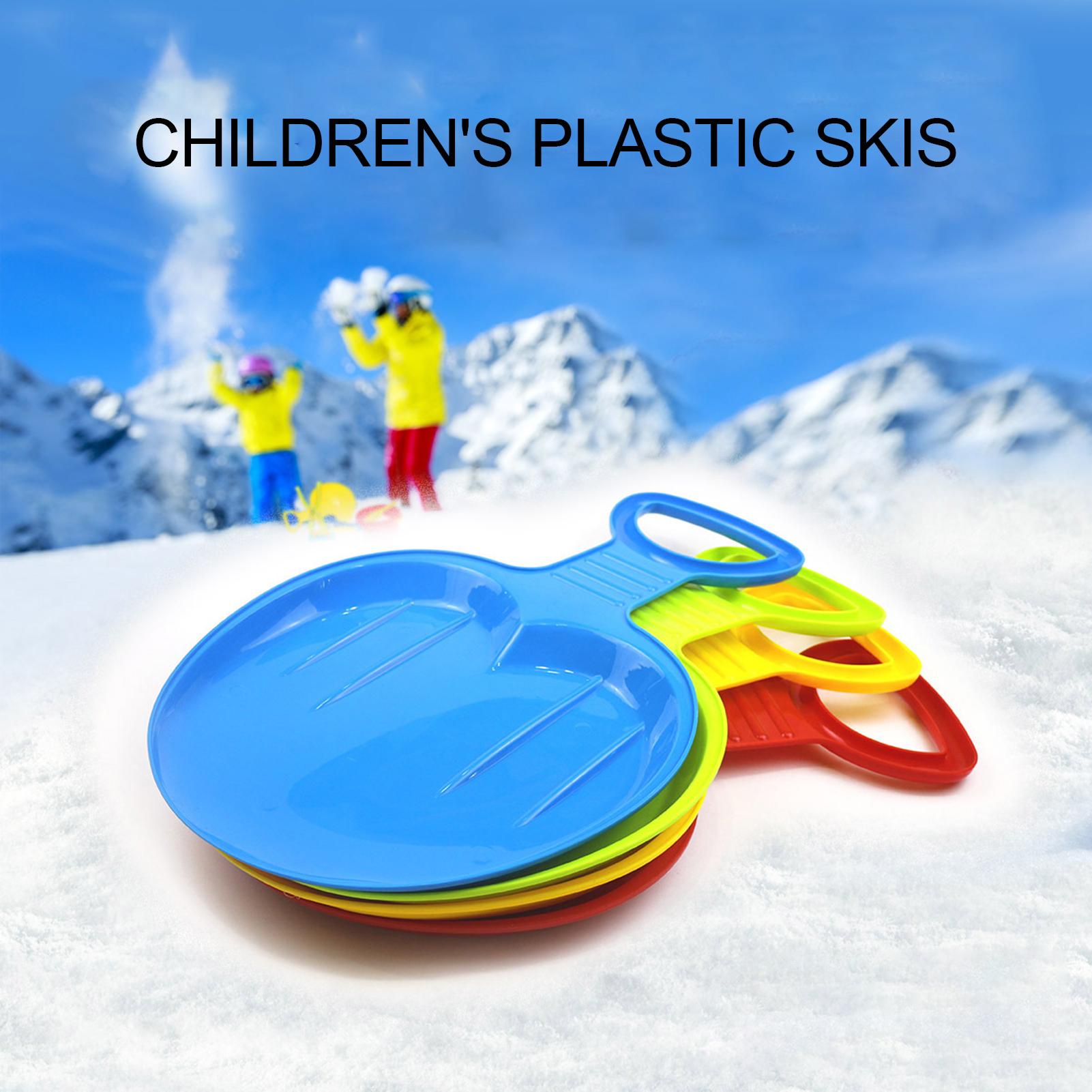 Børn udendørs vinterpark græsplæne sneslædekælke kælke sport ski board
