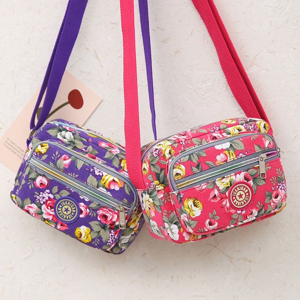 Casual rugzak messenger tas van nylon canvas, schoudertas met meerdere lagen en bloemenprint, moedertas, dames crossbodytas