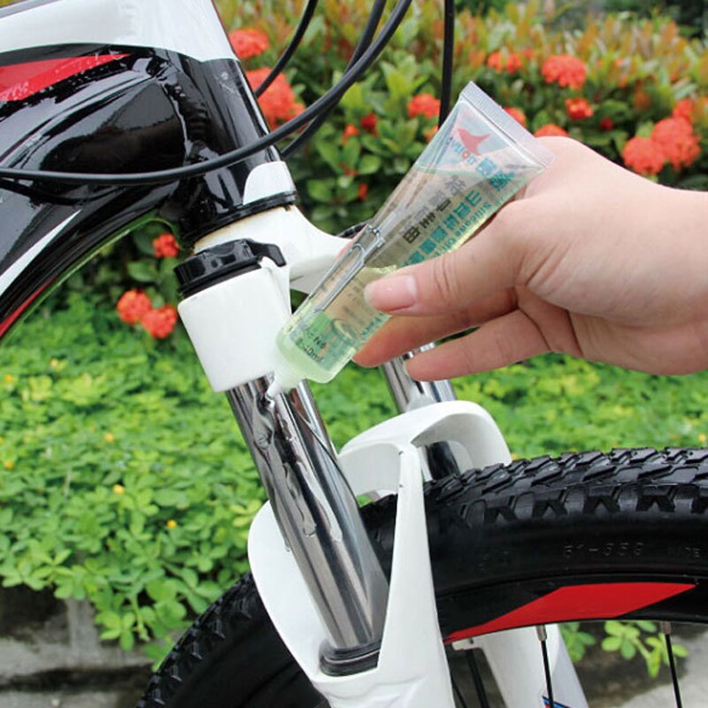 Suspensión de aceite para bicicleta de montaña, horquilla delantera de silicona, lubricante, mantenimiento antioxidante, amortiguación de silicona para ciclismo, aceite especial