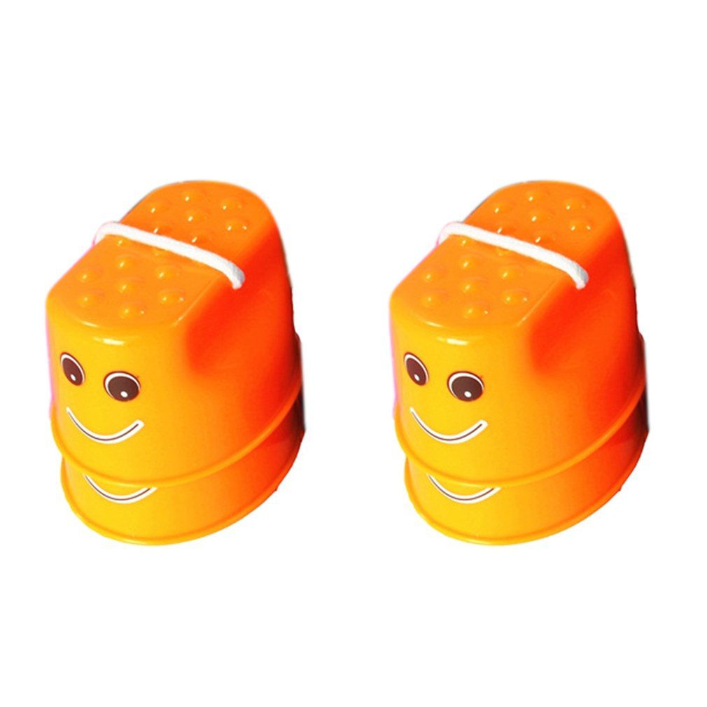 OCDAY 7 Farben 1pc Spaziergang Stelzen Jump Spielzeug Kunststoff Lächeln Gesicht Muster Kinder Outdoor Fun Sport Balance Training Spielzeug beste: Orange