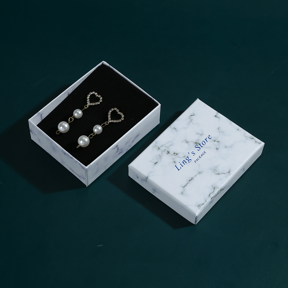 Decoratieve faux boek sieraden doos met magie voor armband oorbellen