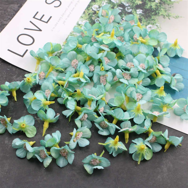 50 stuks 2cm veelkleurige madeliefjeshoofdjes mini zijden kunstbloemen voor kransen, scrapbooks, decoratie voor thuis en bruiloften: Tiffanyblauw