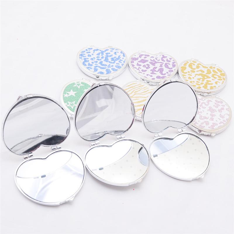 Mini poche en forme de coeur maquillage miroir cosmétique Compact miroirs Portable Double côtés maquillage miroir pour les femmes (couleur aléatoire)