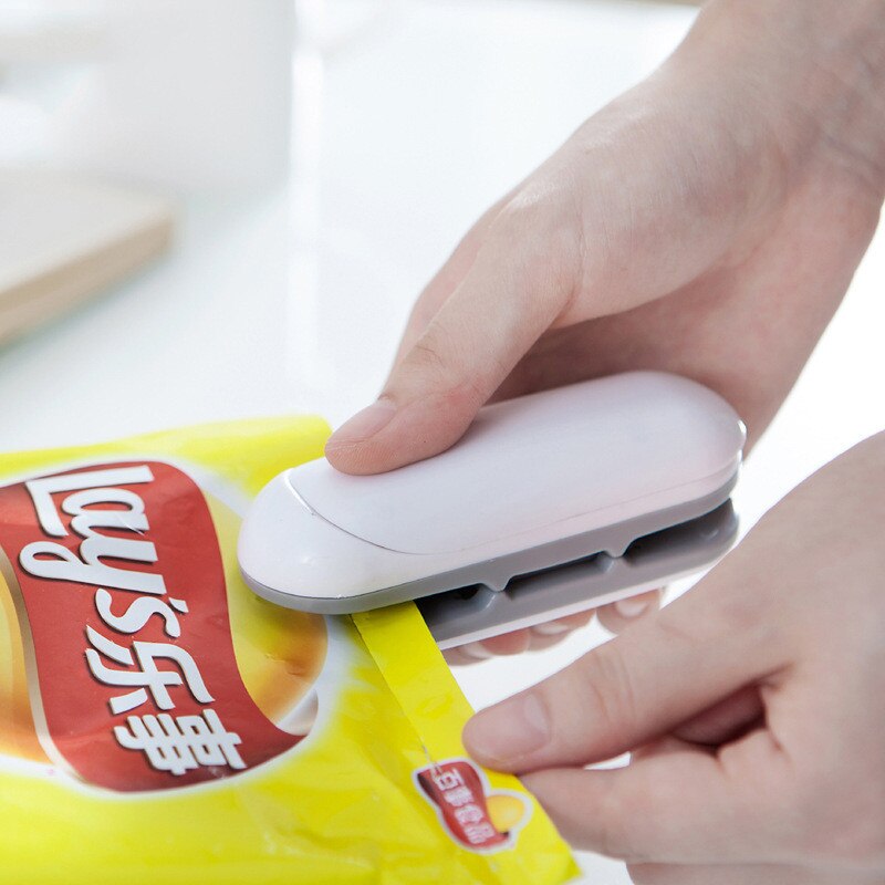 Bärbar miniförseglingsmaskin snacks förpackning vakuum plastpåse handpress värmeförseglingsmaskin stängning av lock