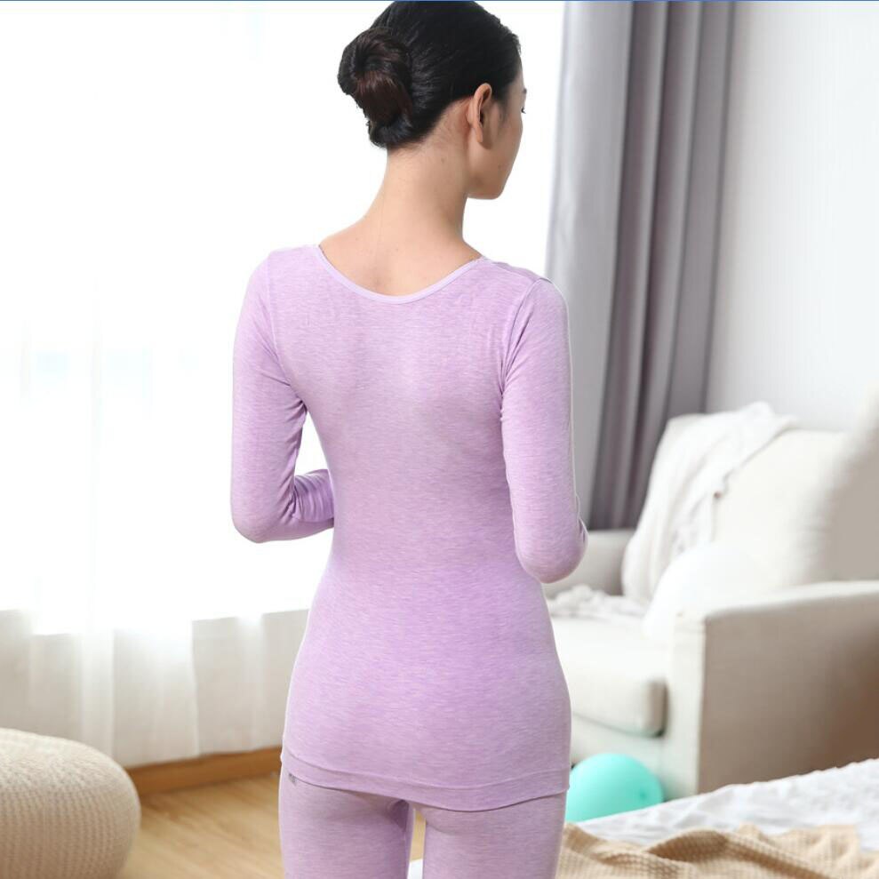 The lady V collar thermal underwear set is made of cotton, thin, seamless body, lace and lace