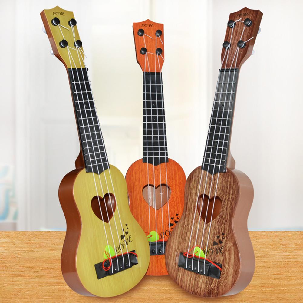 Kind Einfarbig Holz Ukulele Hawaiian Gitarre Griffbrett Saiten Instrument Spielzeug Gitarre Linde Musical Instruments