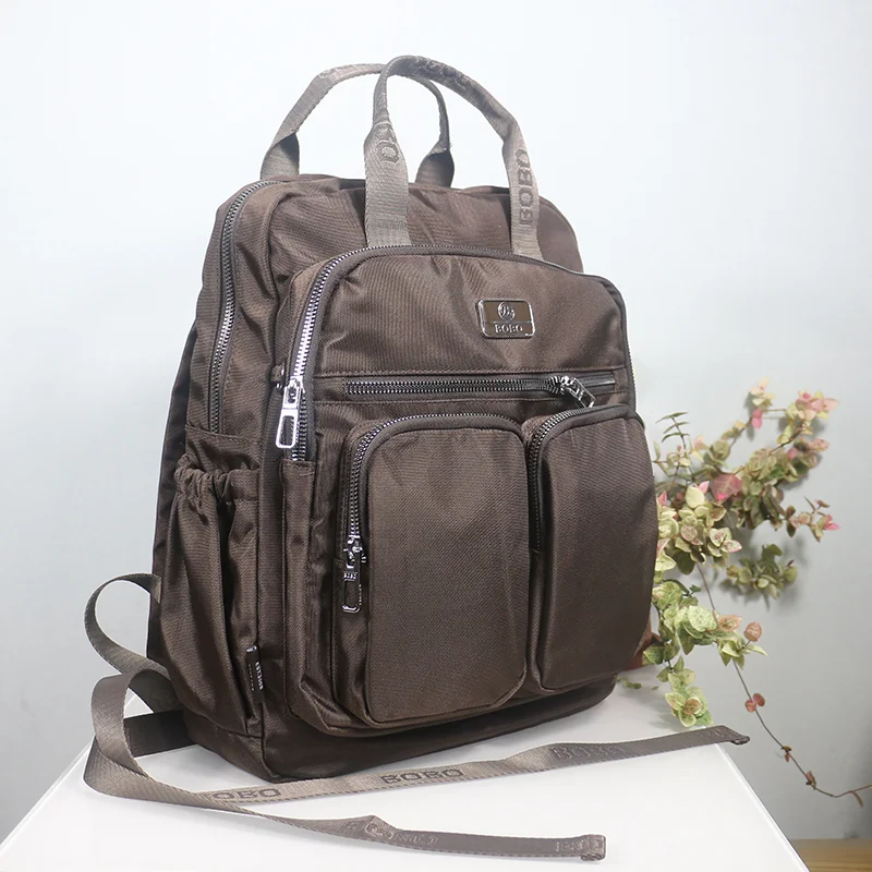 Zaino da viaggio per donna Borsa da scuola ad alta capacità Borsa per laptop leggera e impermeabile Zaino da cabina con tasche multiple per uomo: Oro