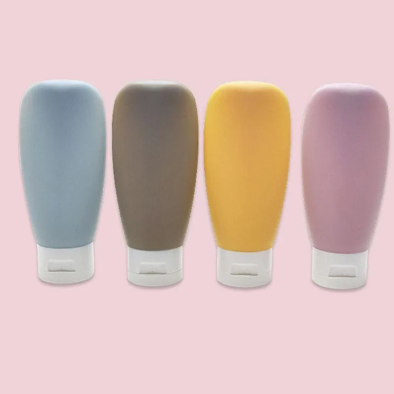 4 pièces/ensemble bouteille rechargeable 60ml récipient de Lotion en Silicone souple Tube à presser bouteille vide bouteille de shampoing de voyage Portable: vert clair