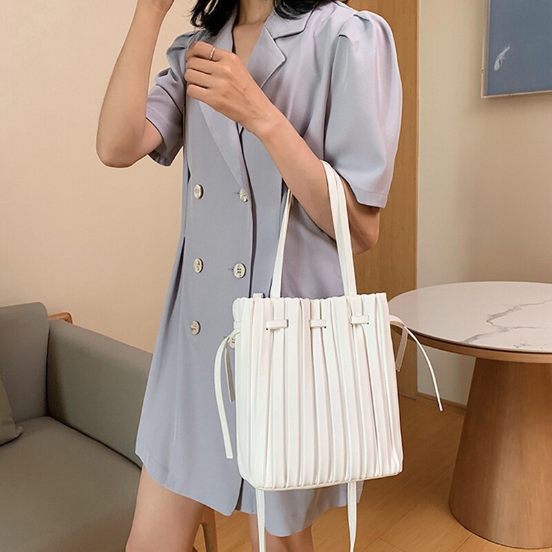 Trekkoord open emmer crossbody tassen voor vrouwen effen kleur geplooide schouder handtassen reis crossbody tas portemonnee