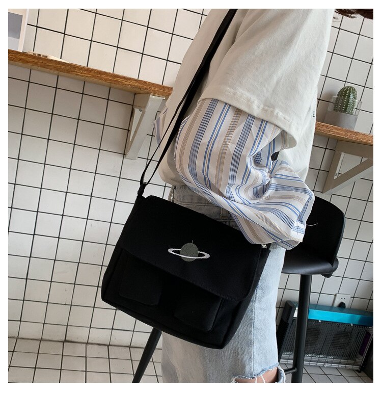 Coreano planeta bolsa de lona feminino 2020 inverno novo estudante selvagem bolsa de ombro grande capacidade multi-bolso saco do mensageiro