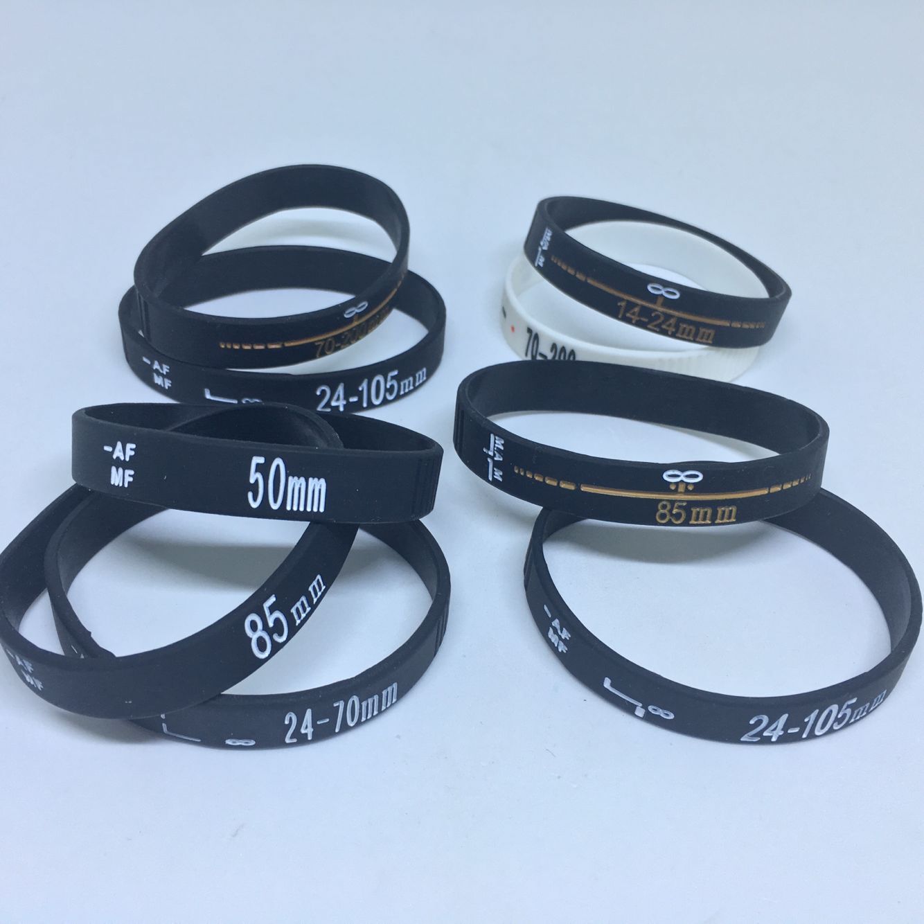 Nouveaux Bracelets d'objectif photographe silicone bracelet Bracelets objectif Zoom fluage pour canon nikon DSLR appareil photo