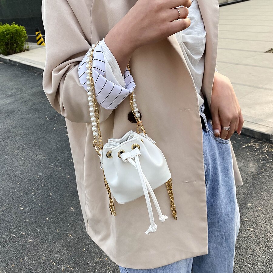 Dames mini emmertas parel handtas pu leer effen kleur ketting schoudertassen kleine schattige dames crossbody handtas