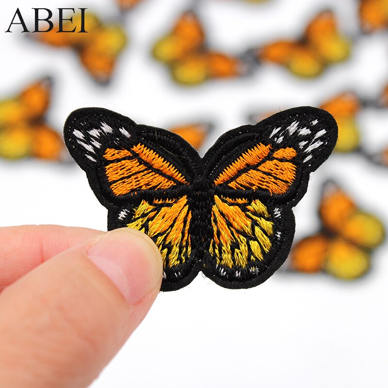 10 stks/partij Jeans Naaien Patches Ijzer Op Oranje Vlinder Stickers Handgemaakte Patchwork Craft Diy Logo Kleding Tassen Motief Badge