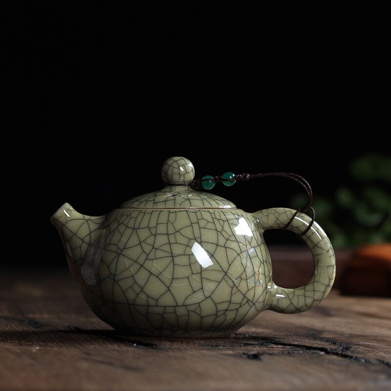 Juego de té con esmalte craquelado, tetera china de cerámica celadón longquan con horno ge, tetera antigua de arcilla yixing.