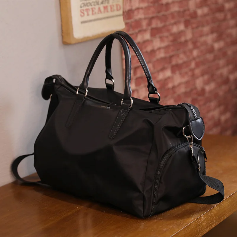Mode reistas Draagbare plunjezak Korte stof Lichtgewicht Oxford Grote maat bagage draagtas Handtas voor mannen en vrouwen: Bruin