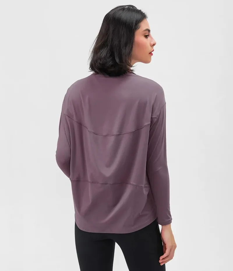 Løst yogatøj til kvinder til forår og efterår, nøgen og hudvenlig tynd fitnesssports-pendler-t-shirt med lange ærmer
