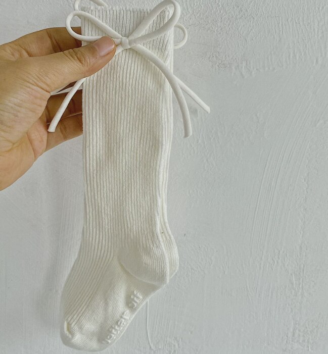 Chaussettes côtelées pour enfants bas de confort en coton Simple antidérapant pour fille avec nœud pour la décoration des robes de printemps d'automne
