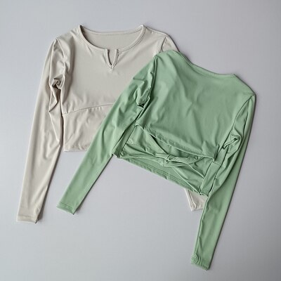 #39 , figurbetontes sport-langarmshirt für damen mit freiem bauchnabel, v-ausschnitt und offenem rücken – schnelltrocknend, ideal zum laufen, trainieren, fitness und yoga.