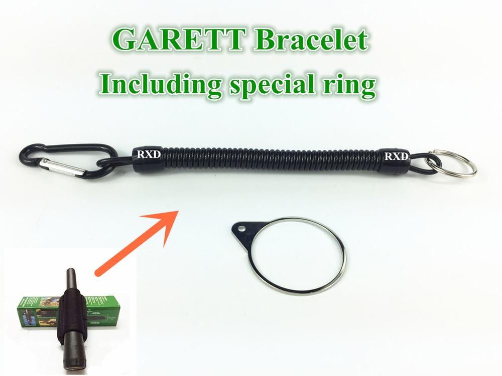Bracelets de détecteur de métaux pour localiser le détecteur de métaux tenu dans la main de Bracelet