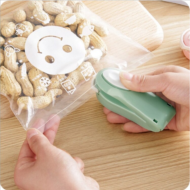 Home portable household mini sealing machine hand pressure heat sealing machine laminator sealing clip travel