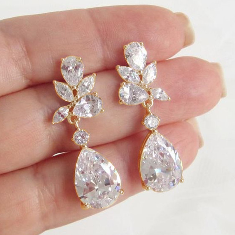 Huitan kristallen oorbellen met glinsterende zirkonia steentjes, elegante damesoorbellen in zilverkleur, trendy sieraden: Bruin