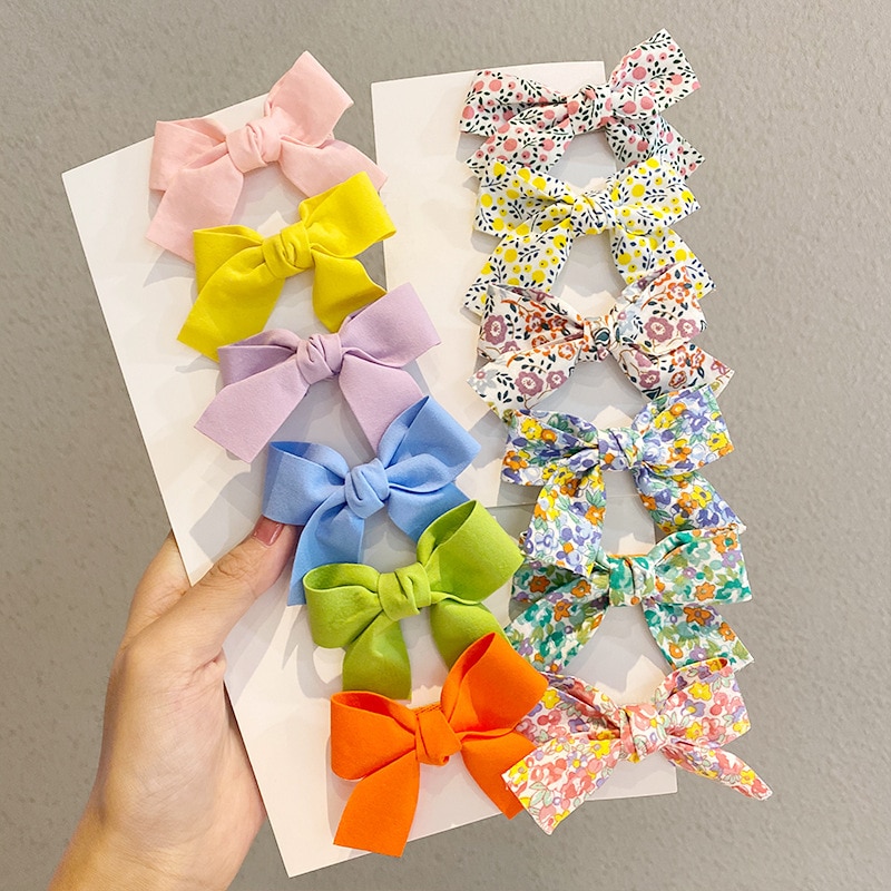 2 unids/set niñas niños Color caramelo sólido horquillas corbata de lazo Floral broches de pinzas de cabello coloridas sombreros Bebes Accesorios