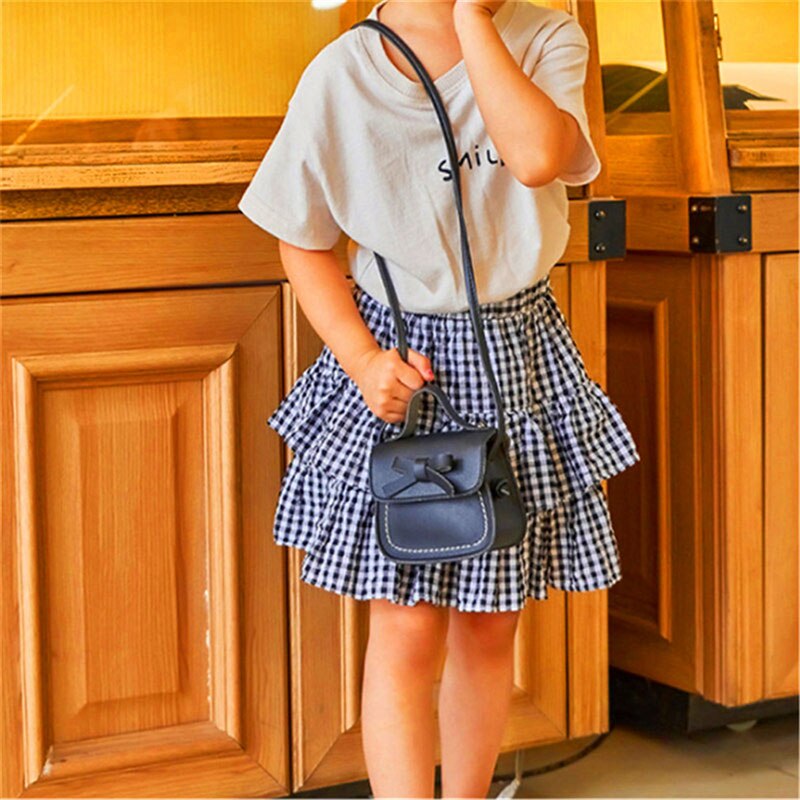 Merkevare småbarn baby messenger bags barn barn jenter prinsesse skulderveske håndveske solid bowknot prinsesse mynt vesker