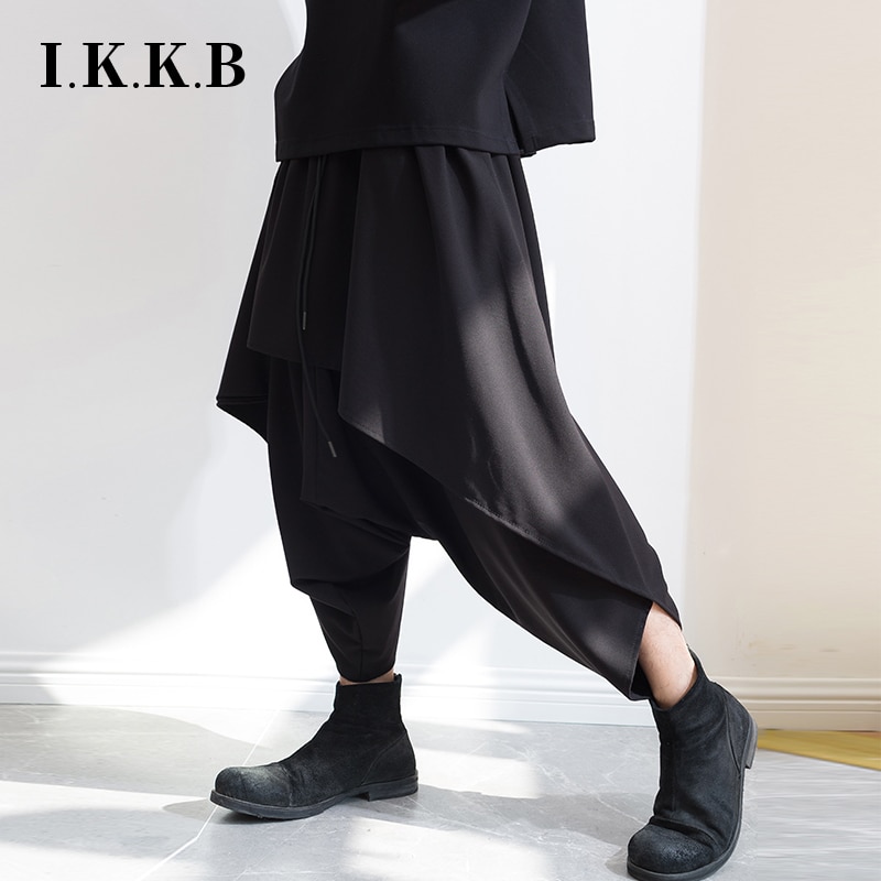 Lente en herfst heren casual broek kapper rok broek donker zwart persoonlijkheid onregelmatige tij mannelijke harem broek negen poi