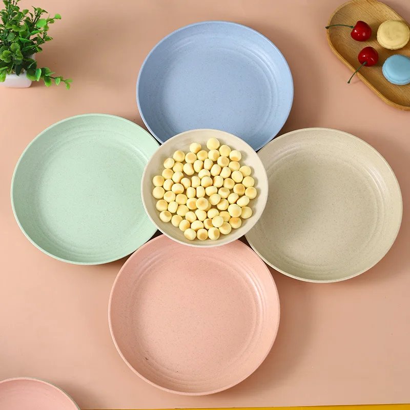 Moderne middagstallerkener til husholdningen, runde køkkentallerkener af hvetestrå i plastik til mad, sauce, fad, smagsbræt, snacks og frugt