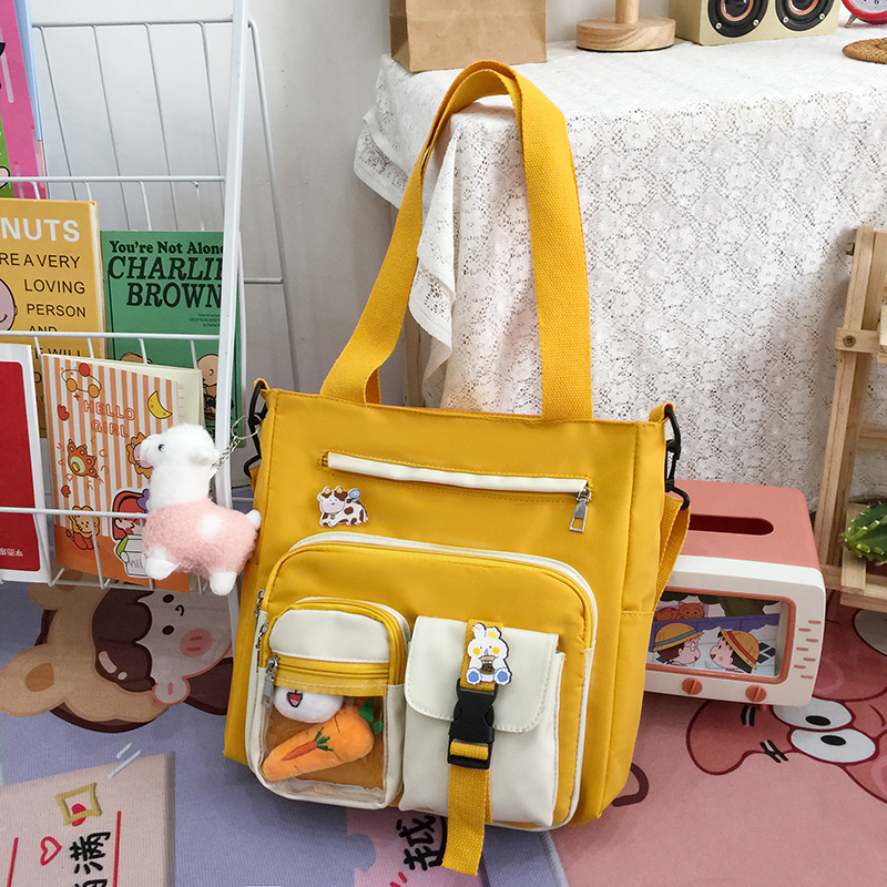 Ins Canvas Tas Grote Capaciteit Messenger Bag Vrouwelijke Multi-Pocket Koreaanse Harajuku Ulzzang Wilde College Student Klasse Tas: yellow-Pendant