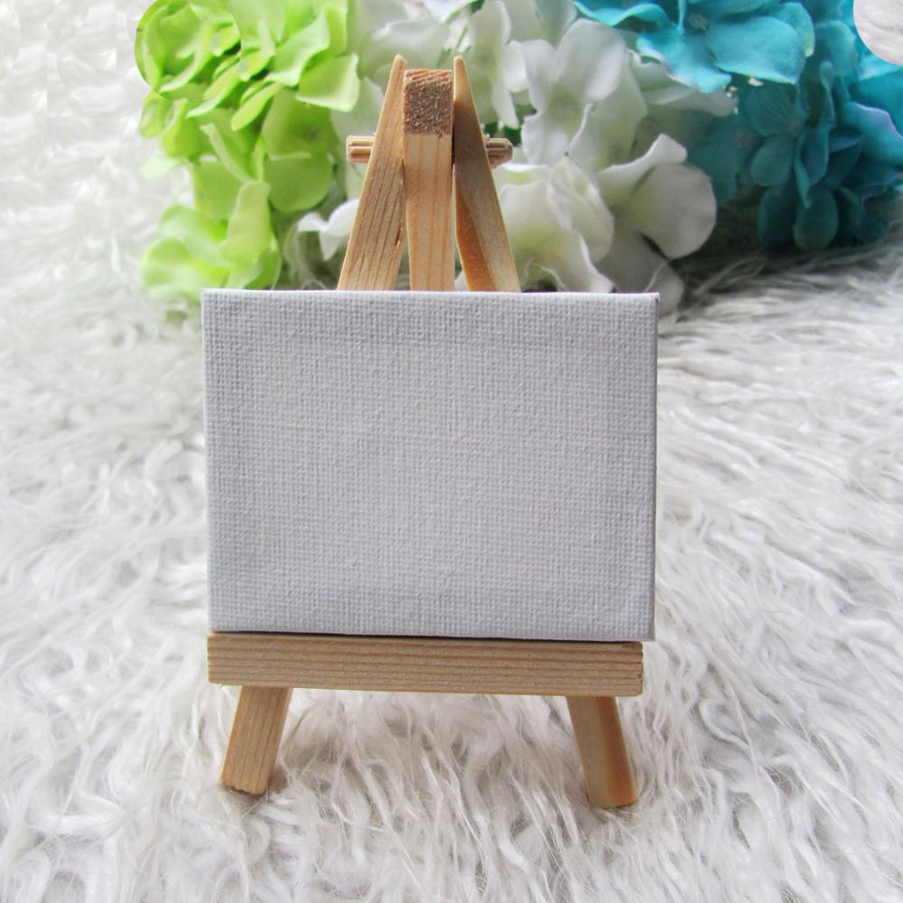 Stilleven Met Schildersezel Met Een Lege Canvas, Een Waterverf En Een Orchi Stock Foto - Image