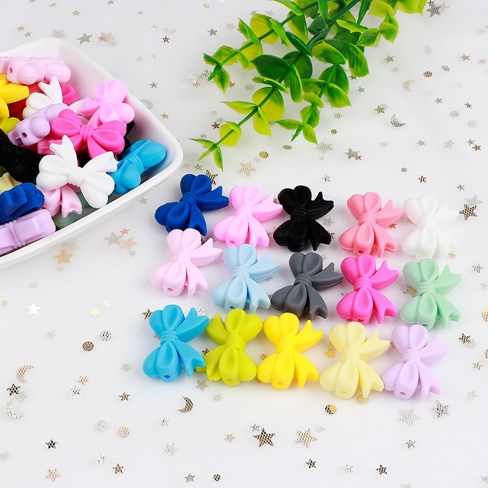 *20 st tecknade silikonpärlor bpa gratis fluga barnmatskvalitet tandningshalsband diy bowknot tuggbar barnbarns tandning