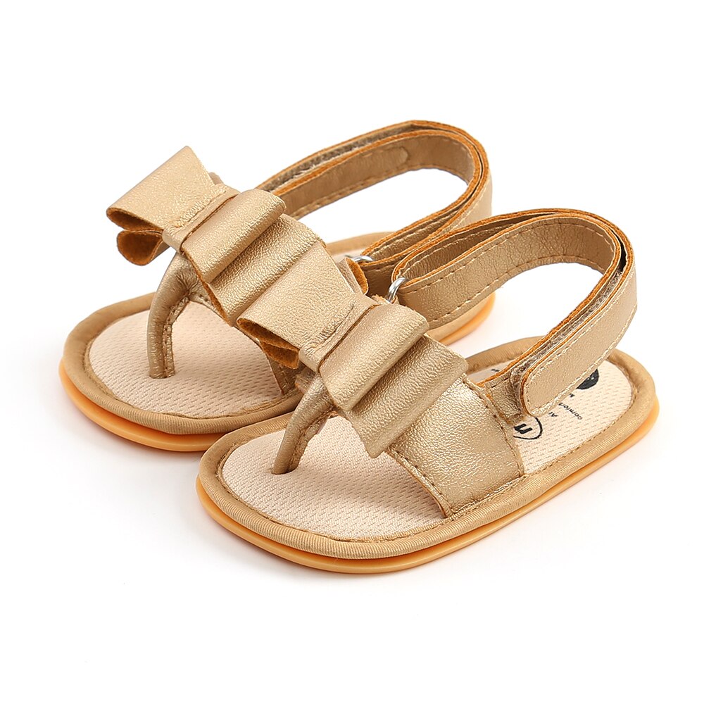 Sandalias planas con lazo para niñas pequeñas, chanclas con correa en T, de Color sólido, simples: Oro / 0-6 meses