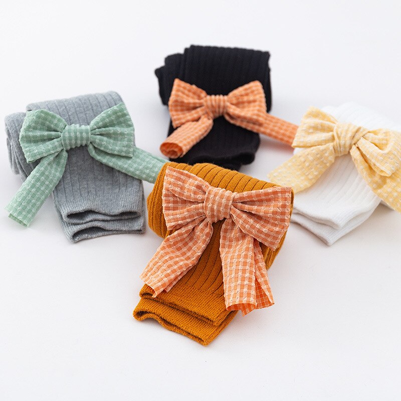 Doce cor sólida bowknot collants do bebê outono inverno quente criança leggings princesa macio respirável criança menina meia-calça