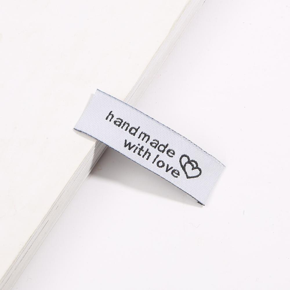 20 unids/lote 50x15x15mm hecho a mano etiqueta bordado impreso etiquetas ropa bandera etiqueta para prendas DIY Etiqueta de accesorios de costura: White