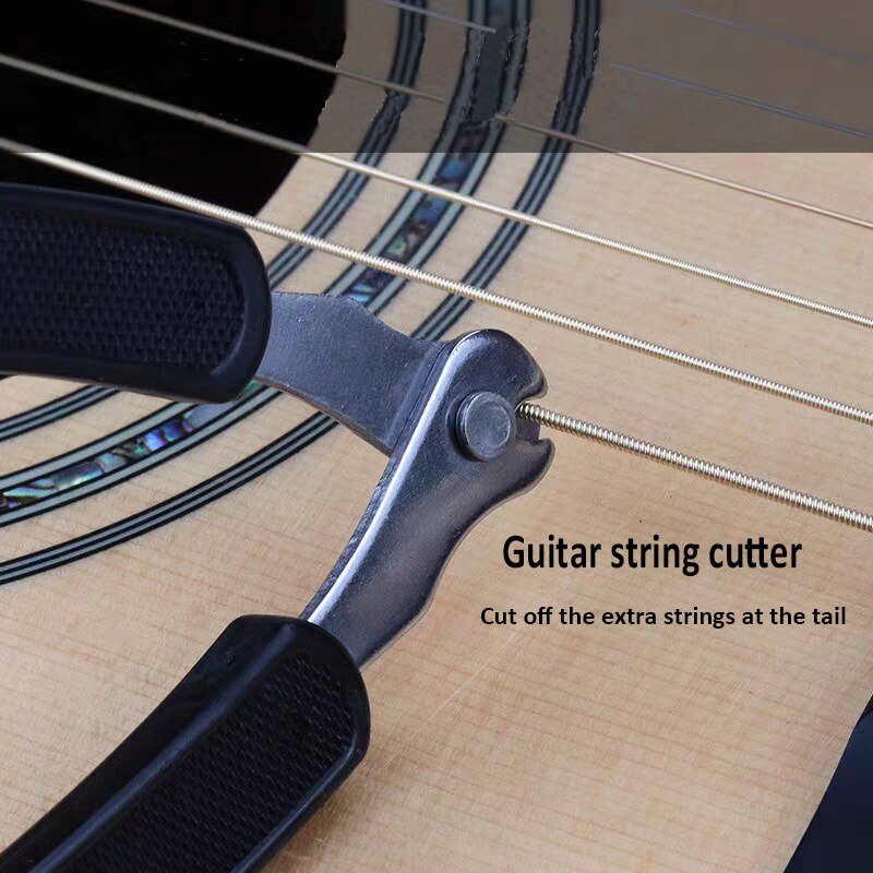 Acoustic guitar string changing tool installed string trimmer winding and winding three-in-one pliers stringing nail remover bak