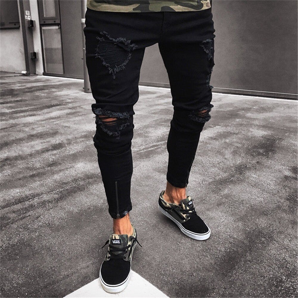 Black jeans with holes discount