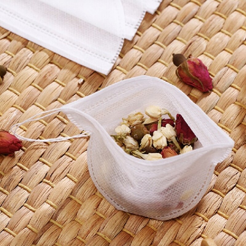 Bolsa de té desechable de tela no tejida, 100 unidades por lote, bolsas de filtro de almacenamiento con cordón para flores secas y hierbas