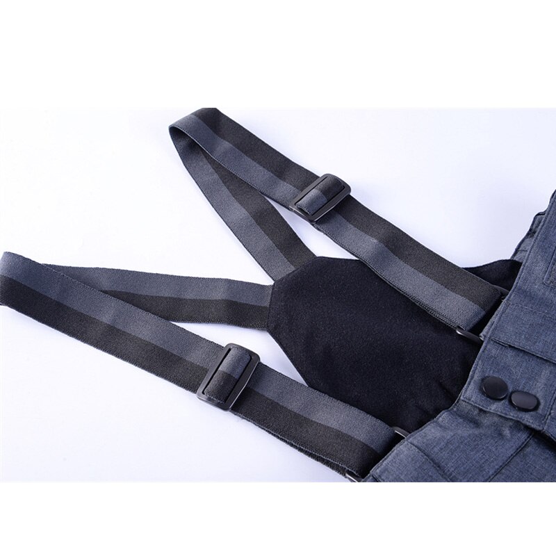 Dziecięce spodnie w paski z lodem śnieg na nartach spodnie zimowe na zewnątrz snowboardowe wodoodporne wiatroodporne dla dziewczynki i chłopca