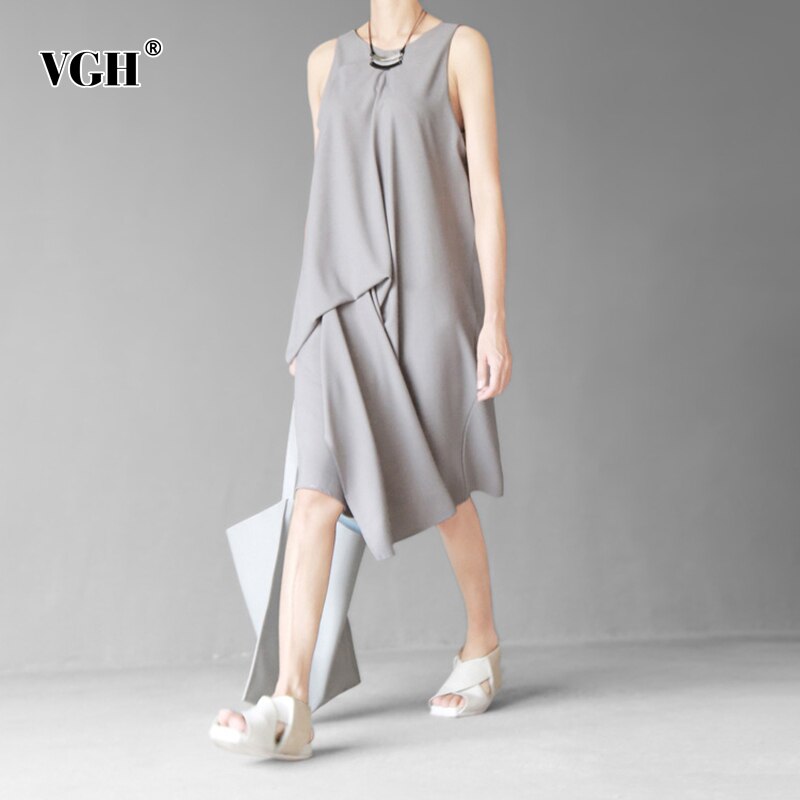 VGH vestido negro Casual para mujeres O cuello sin mangas dobladillo Irregular holgado Midi Vestidos Mujer de tendencia ropa verano